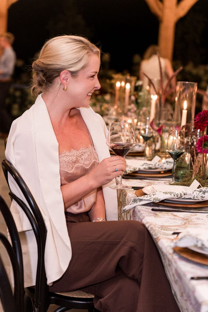 Community dinner atmosphere designed by Chelsea Quenum Weddings & Event Design at Clyde’s Willow Creek Farm.